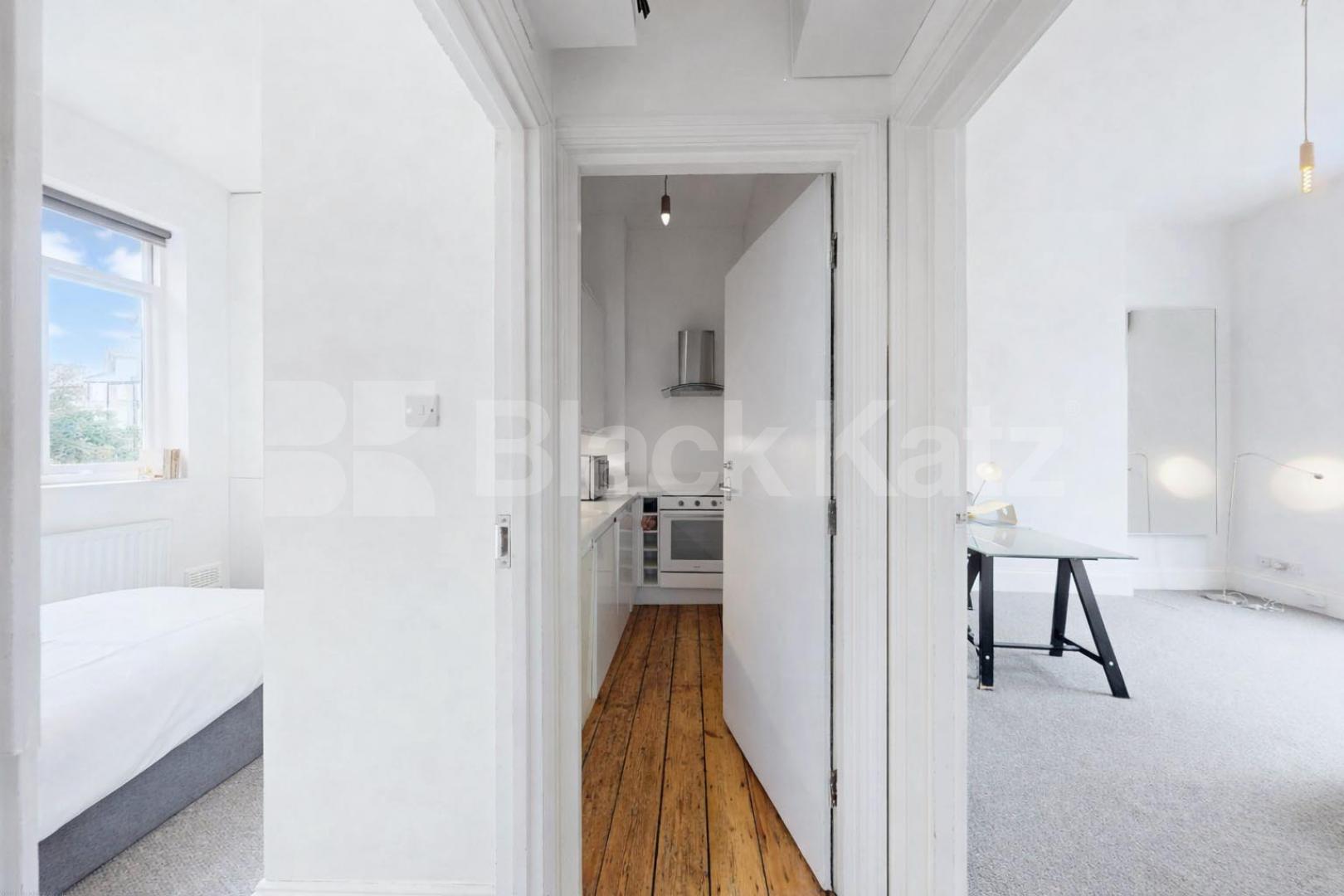 Elegant Raised Ground Floor Apartment in Sought-After NW1 Camden Park Road, Camden